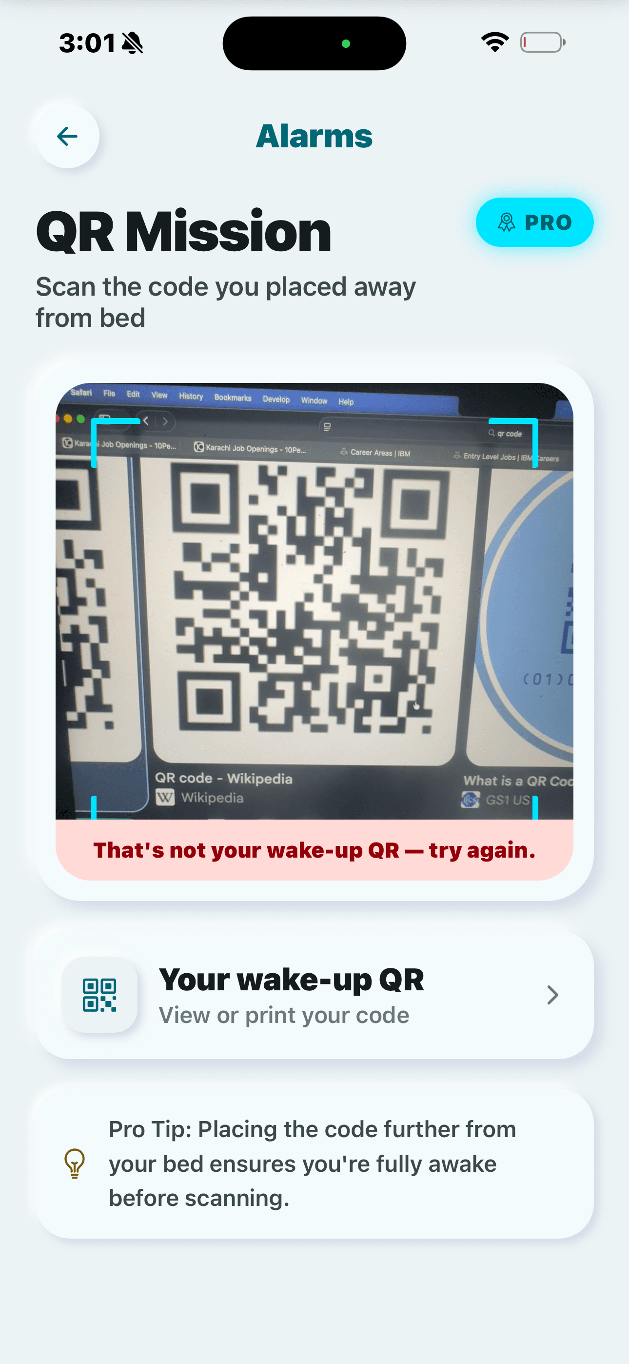 QR Scan Mission screen (Pro): a camera view scanning a QR code with the message “That’s not your wake-up QR — try again,” plus a link to view or print your code.
